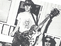 1977-00-00 - metal mike and gregg turner 1977 VOM Kiss t shirts GREEN DAY POSE.jpg